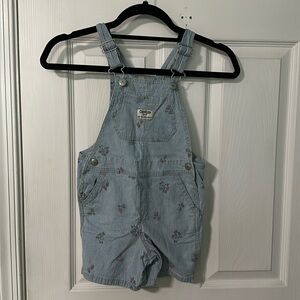 OshKosh Overall Shorts with pin strip details and small clusters of flowers